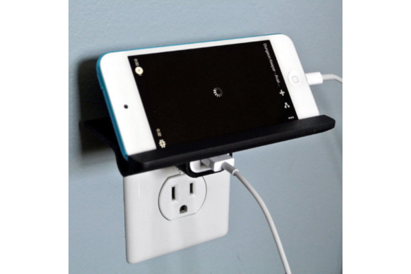 Wall outlet shelf