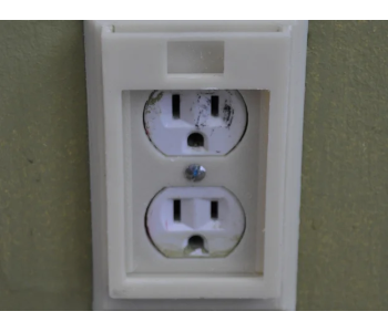 Childproof outlet cover